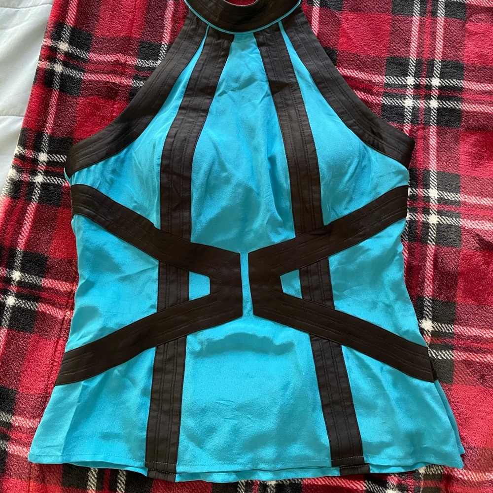 BEBE Silk Top in teal blue color & black pattern